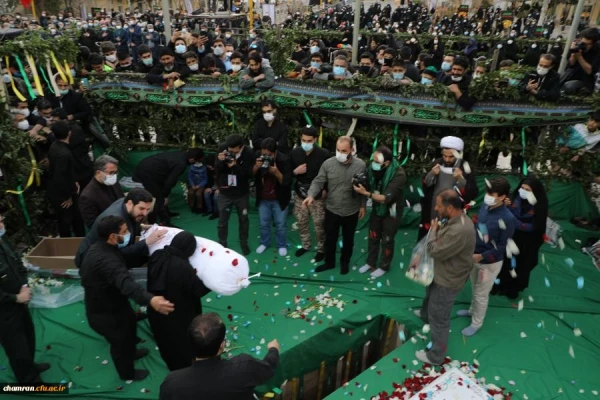 حضور مسئولین و کارکنان پردیس نسیبه در مراسم تشییع و خاکسپاری شهید گمنام در پردیس شهید چمران 4